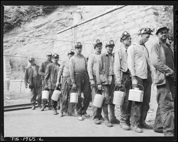 2402px-Miners_checking_in_at_the_lamp_house_at_completion_of_morning_shift._Koppers_Coal_Division,_Kopperston_Mines..._-_NARA_-_540922